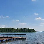 Дом отдыха Mazury Witaja - Nowoczesny Dom Nad Jeziorem Samin